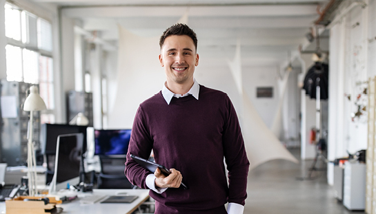 man standing in an office