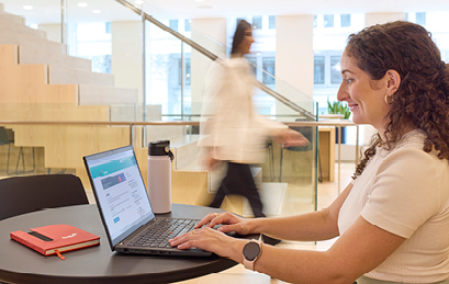 a bdc employee visiting the employee portal on her laptop