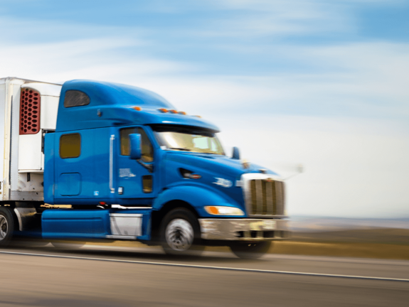 blue truck in movement