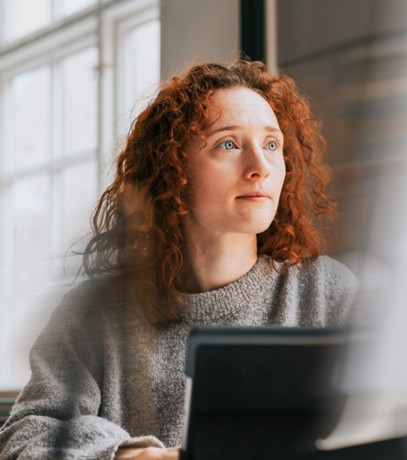 woman looking at a laptop