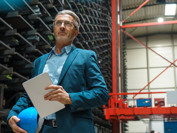 entrepreneur standing in his warehouse