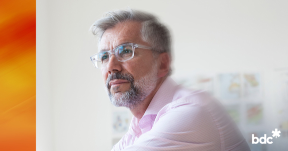 Mature man thinking in an office